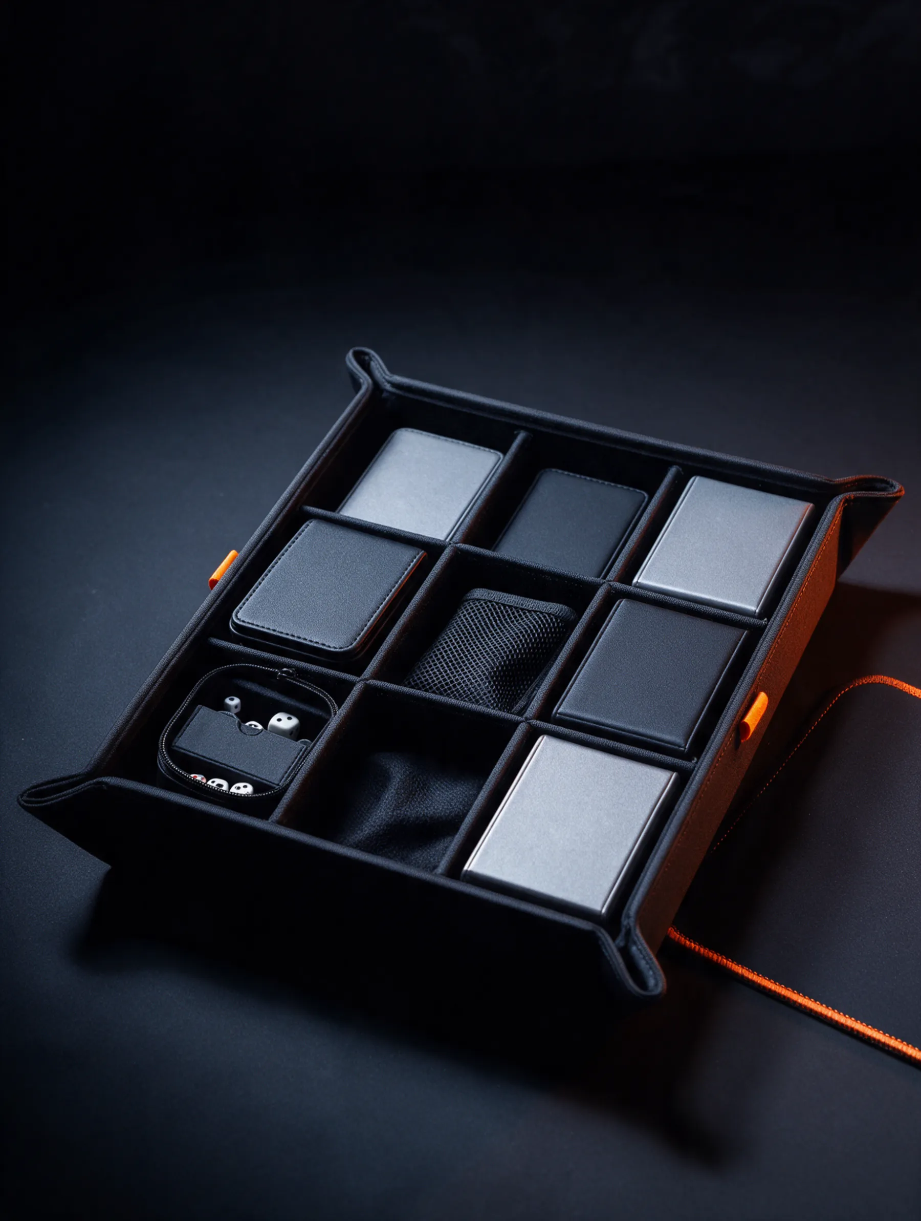 The Tempo organizer tray lying flat on a gaming table, deck boxes and dice box in their slots.